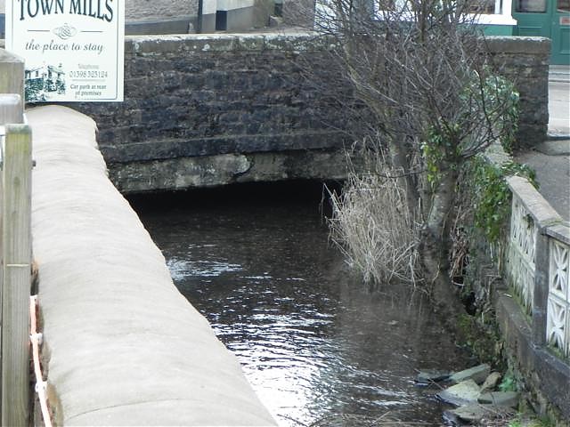 Flows beneath Bridge Street